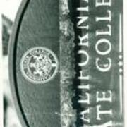 Close up of metal California State College sign
