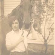 Carrie Goodell with horse, ca. 1920