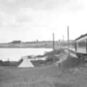 All aboard for Erie - notice abscence of trees towards sunset heights