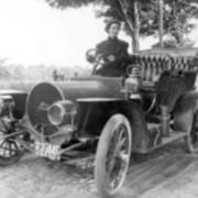 Mrs. Helen Dundon Rye drives an air cooled Franklin along Water St. Extension